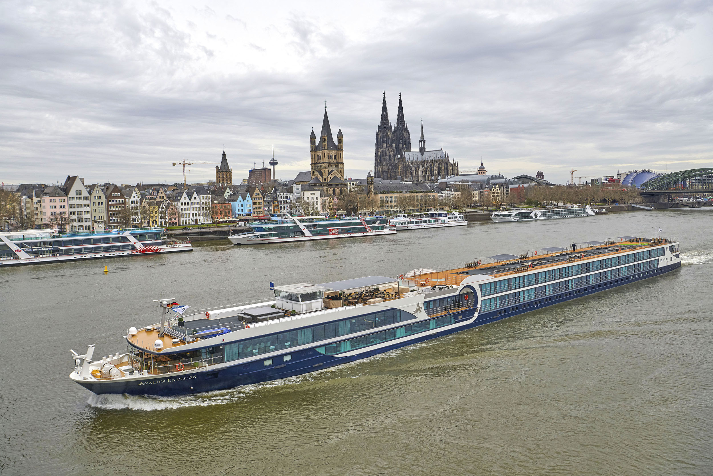 Avalon Envision river cruise ship passing Cologne cathedral